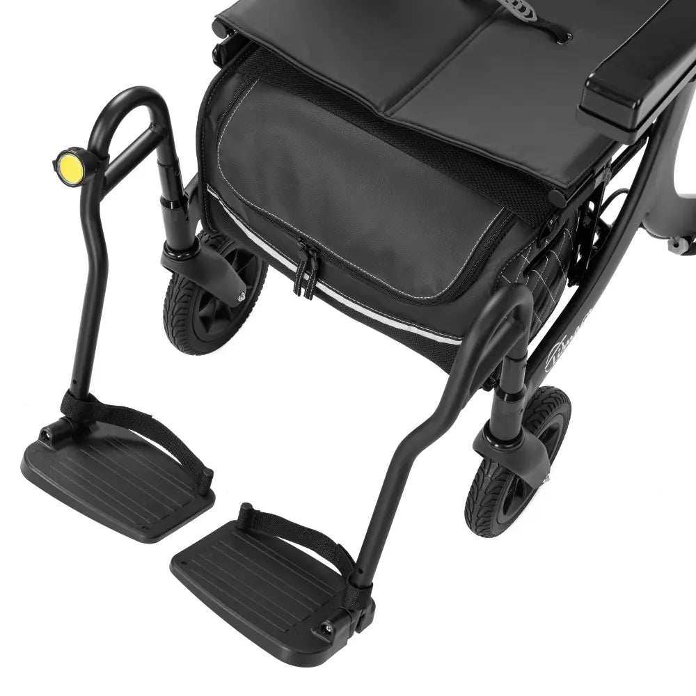 ZORRO el-rollator fodstøtter med hælremme set oppefra, med refleks og taske under sædet